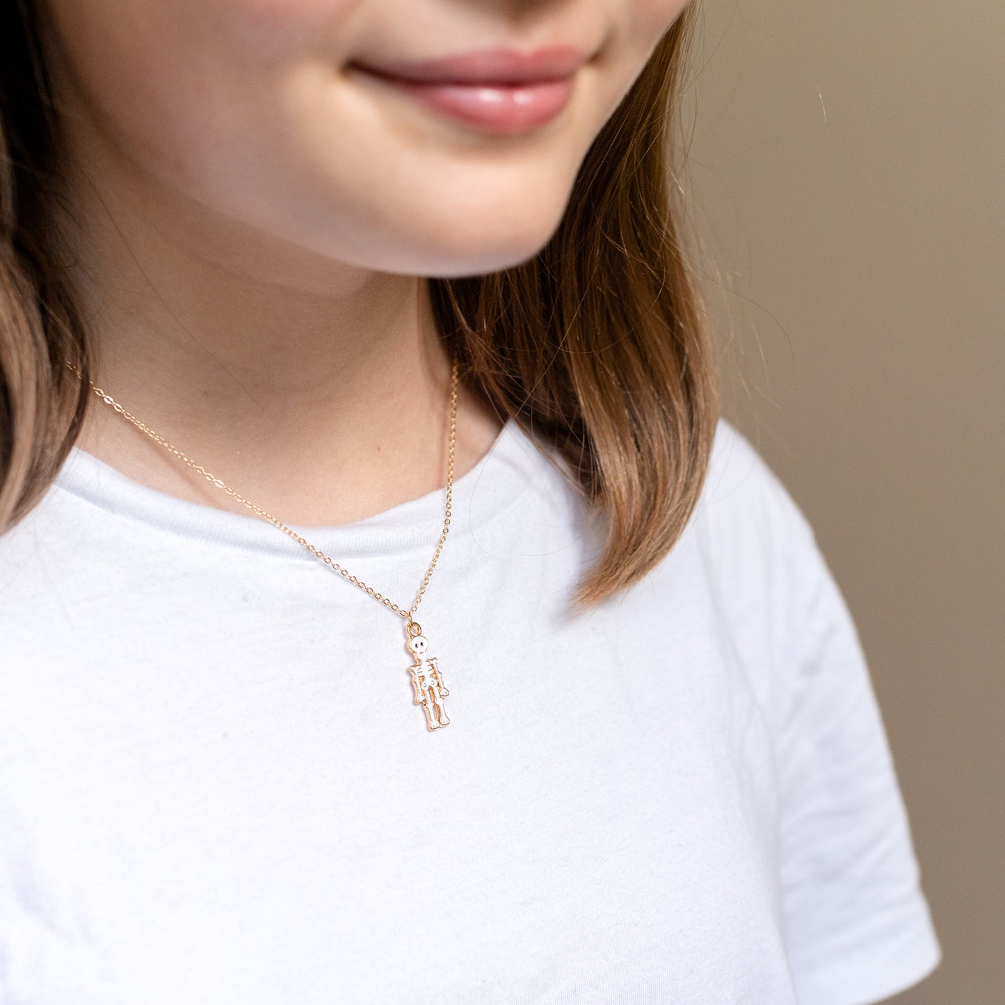 White Skeleton Charm Necklace – A fun and spooky accessory perfect for Halloween or everyday wear